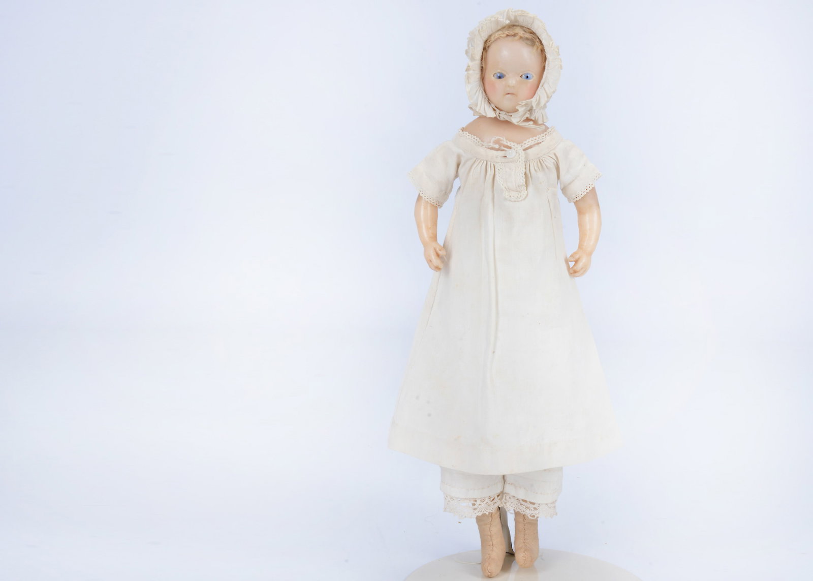 An early poured wax shoulder-head doll with sleep eye mechanism, probably early 19th century, (1 of 2)