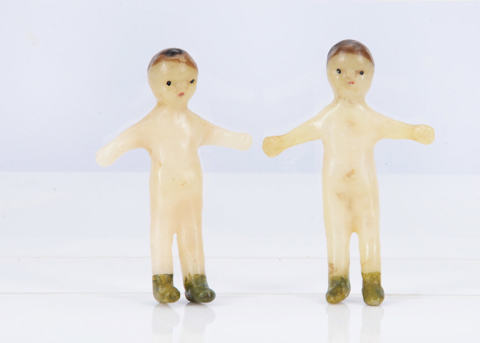 Two small poured wax dolls, probably early 19th century, (1 of 2)
