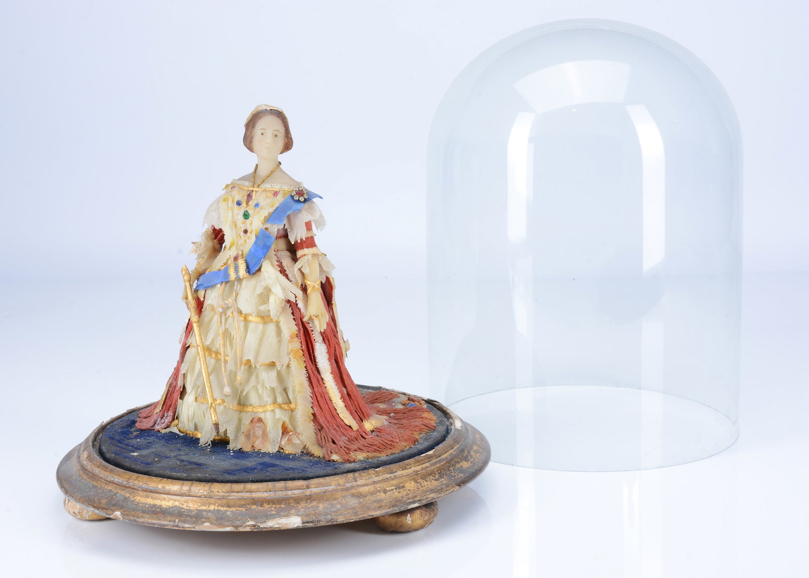 A rare early 19th century Henrietta Wade wax figures of Queen Victoria in coronation robes,: A rare early 19th century Henrietta Wade wax figures of Queen Victoria in coronation robes, a young Victoria with head turned to the right, wax hair with hair looped under the ear revealing ear, white