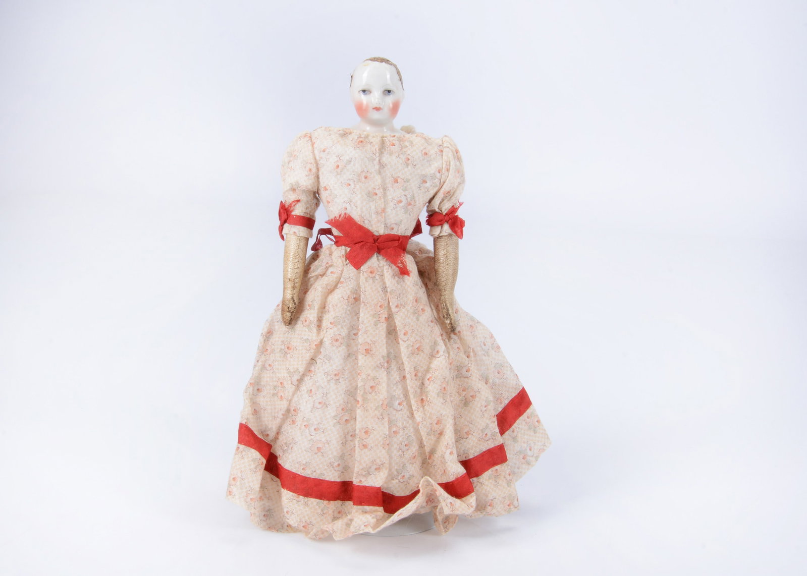 A small 19th century French china shoulder-head fashion doll, (1 of 2)