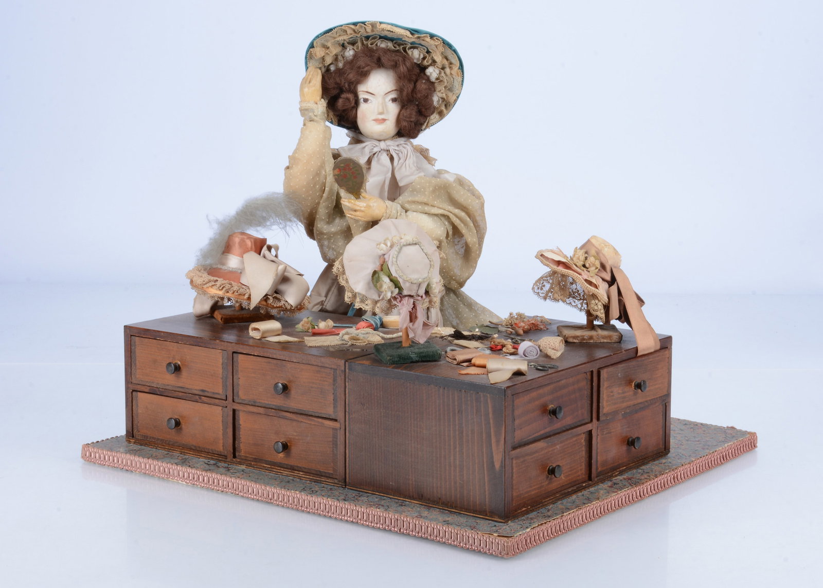 A Sands Film or television theatrical property doll with milliner stall, (1 of 4)