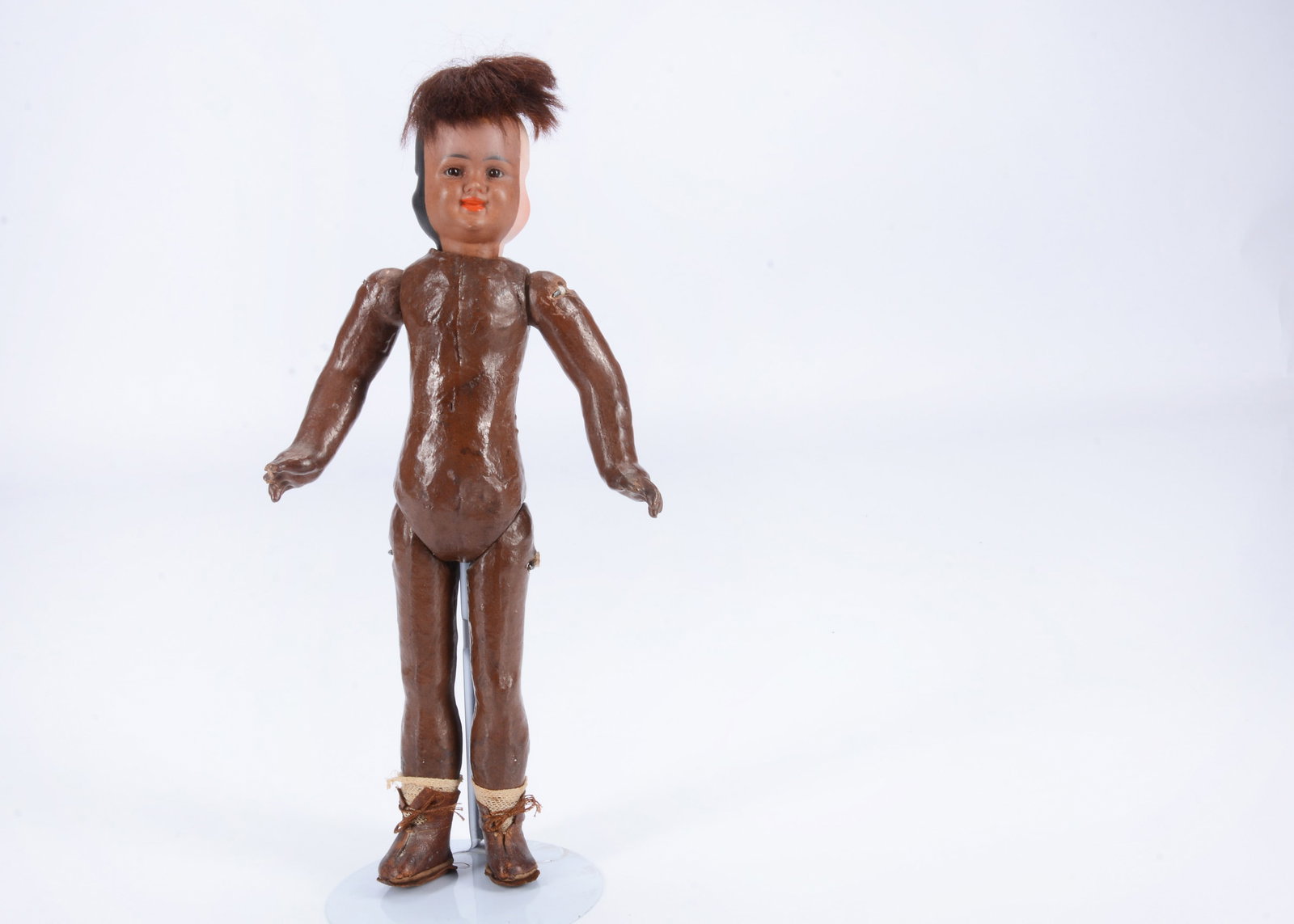 A rare Bergner three faced and raced bisque headed doll, (1 of 3)