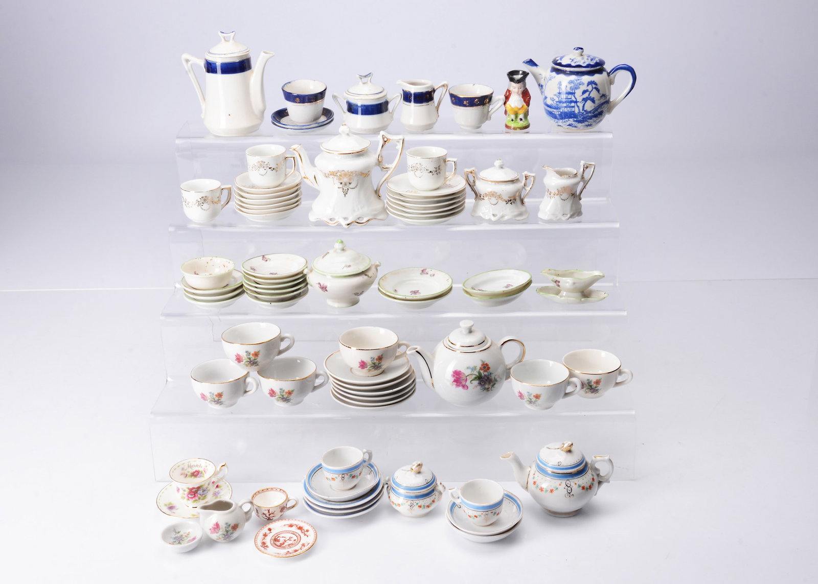 A quantity of mixed doll's dinner services and tea sets, (1 of 2)