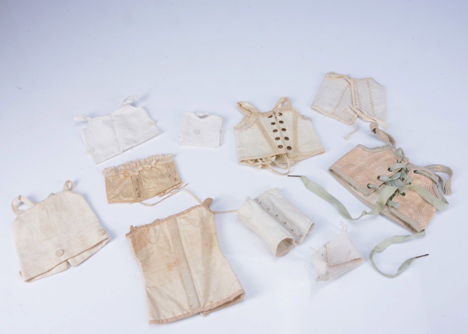 A selection of medium to large sized doll's under garments, (1 of 1)