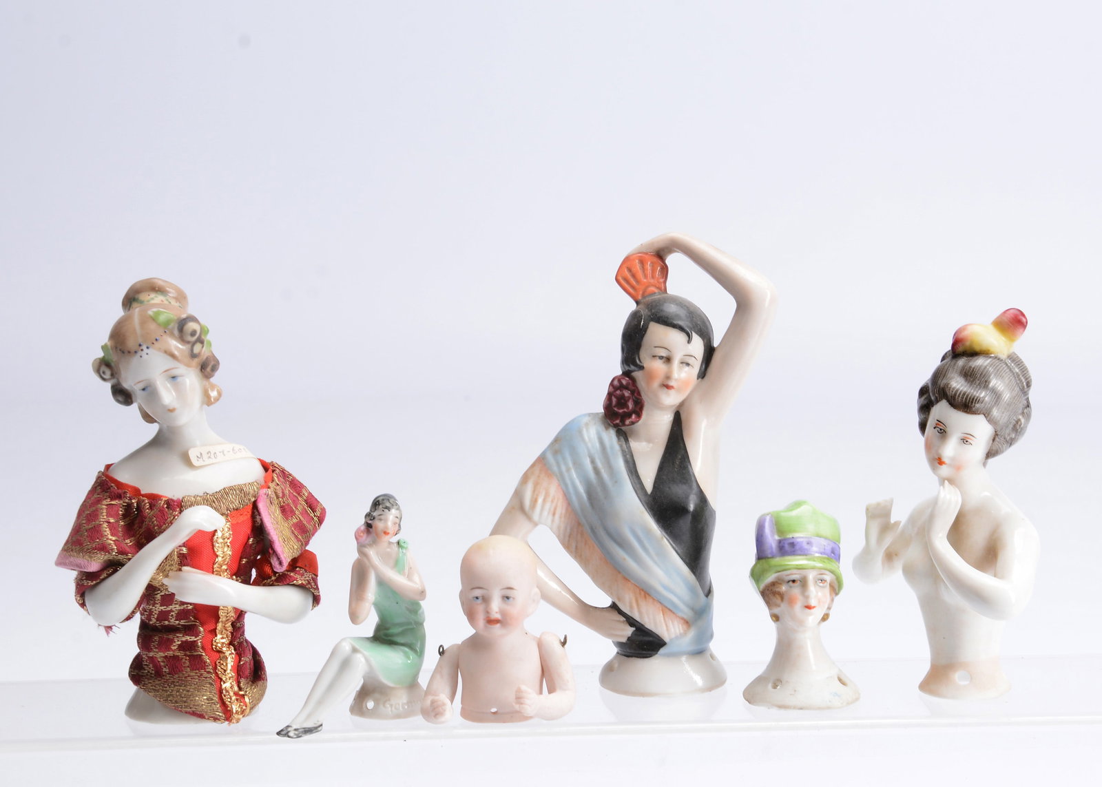 Six half or pin dolls, (1 of 2)