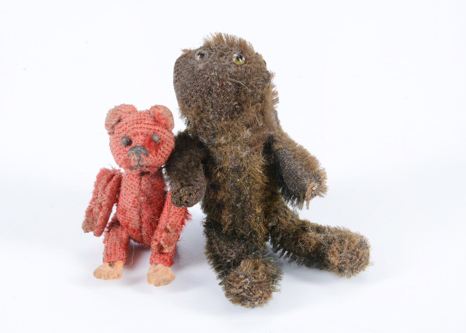 A Farnell WWI ‘soldier’ Lucky Black Cat,: A Farnell WWI ‘soldier’ Lucky Black Cat, with black mohair, yellow and black glass eyes, red stitched nose, felt ears, swivel head and pin-jointed limbs, whiskers and stump of tail —