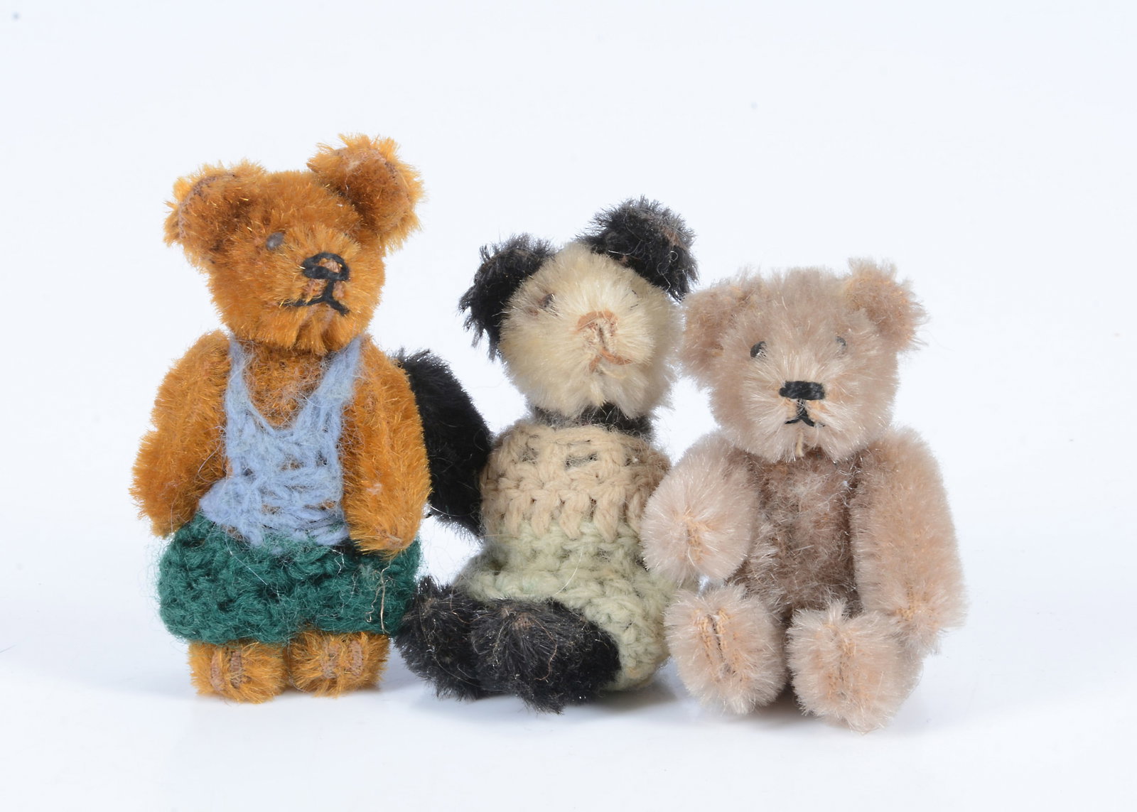 Three post-war Schuco miniature teddy bears, (1 of 1)