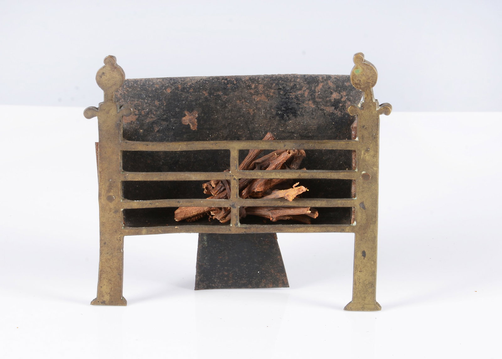 An early English brass dolls’ house fire grate, (1 of 2)