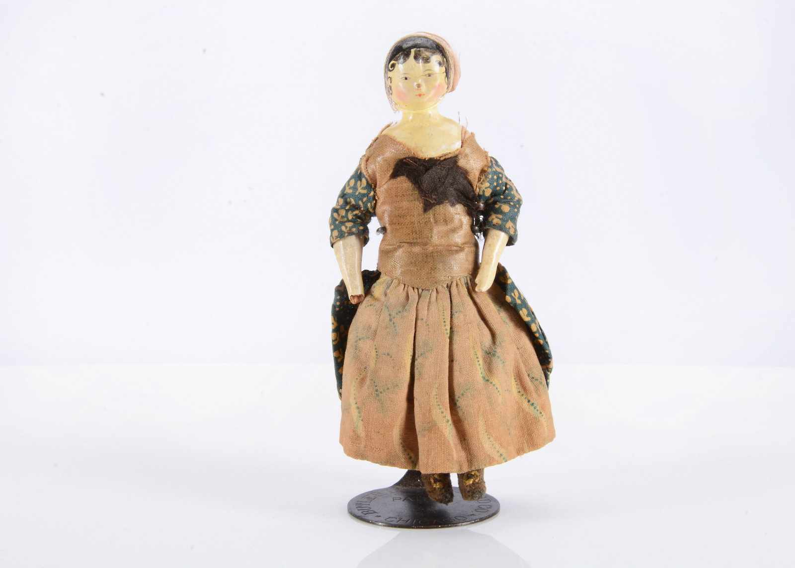 An 19th century Grodnertal wooden dolls’ house doll, (1 of 2)