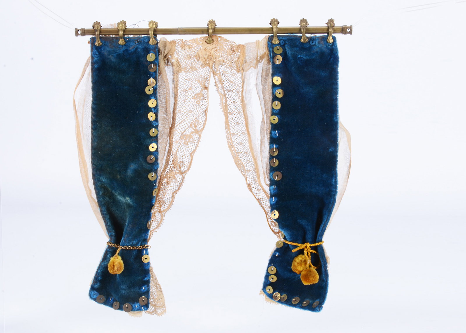 An 19th century dolls’ house curtain, (1 of 2)