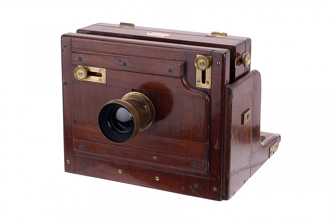 A Watson & Son Half Plate Tailboard Camera,: with stereo septum slot and parallel bellows, with unmarked f/8 brass lens, body, G, cleaning to brass, lens, G, some separation