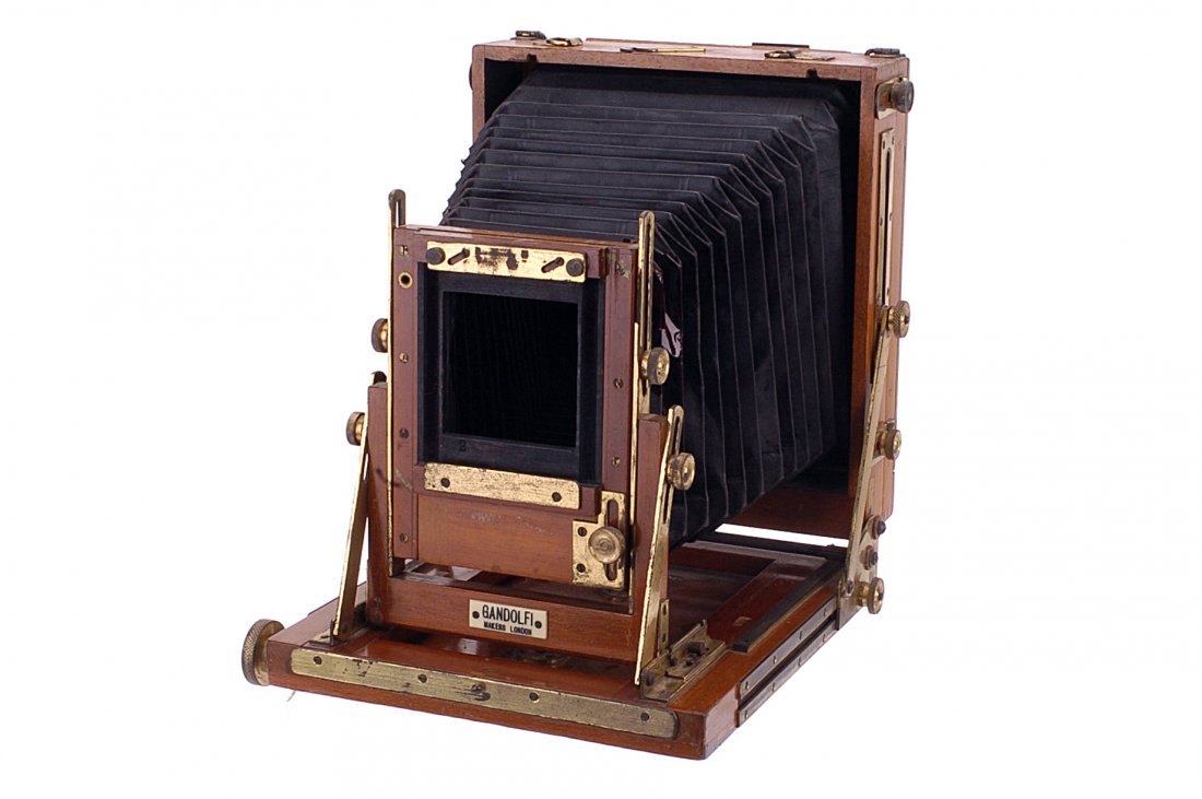 A Gandolfi Half Plate Field Camera,: with Carl Zeiss Jena Tessar f/4.5 135mm lens, circa 1930s, body, F-G, repair to bellows, one focusing screen tensioner bent, lens, F, shutter sticking, not all speeds accessible, with Gandolfi black t