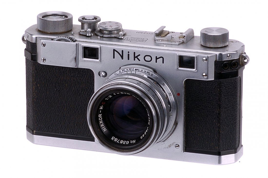 A Nikon S Rangefinder Camera,: chrome, serial no. 6114491, with Nippon Nikkor-H.C f/2 50mm lens, chrome, serial no. 638783, body, G, curtain requires attention, lens release stuck, lens, F-G, internal marks
