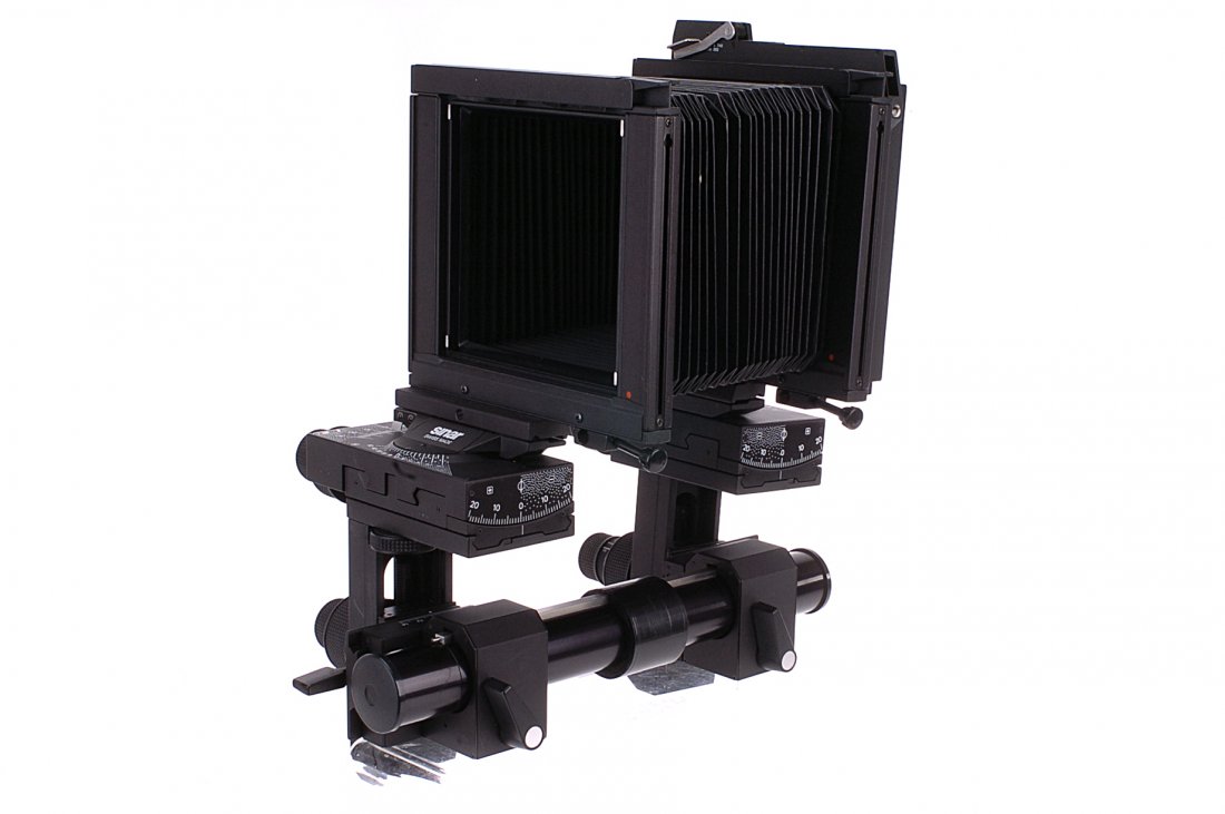 A Sinar P2 Body,: serial no. 90820, VG-E, with various accessories including extension rails, DDS (6), wide angle bellows, Wista 6x7 roll film back and more, in maker's case