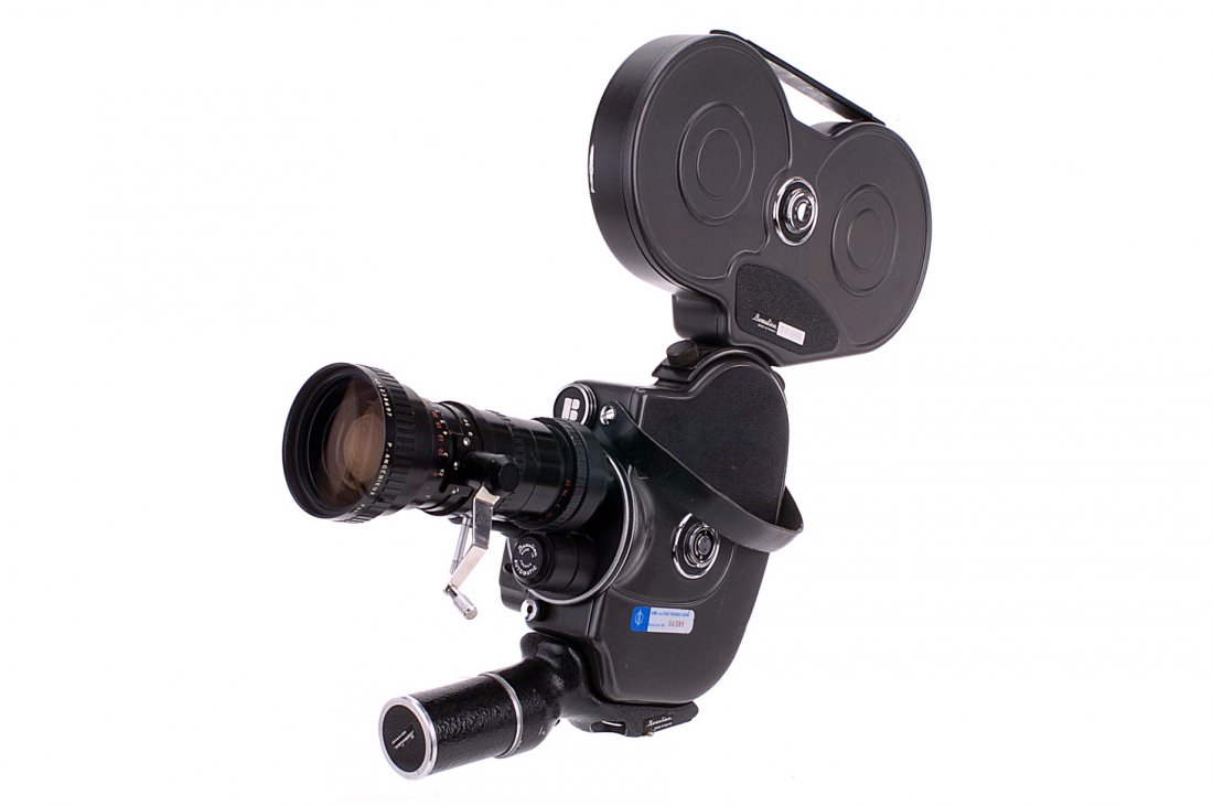 A Beaulieu R16 Automatic Cine Camera,: with P. Angenieux f/2.2 12-120mm lens, body, G-VG, untested, marked with sticker ' Radio and Space Research Station Inventory No. 06388', lens, VG, with magazine