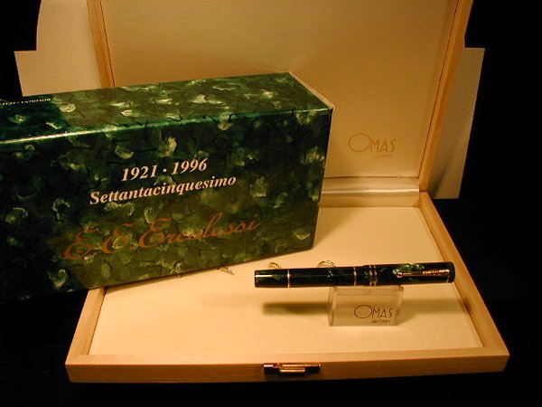 1 OMAS FAMILY, DISTRIBUTOR SAMPLE, ERCOL: 1 OMAS FAMILY, DISTRIBUTOR SAMPLE, ERCOLESSI FOUNTAIN PEN, #1373/1921 18K DECORATED M NIB,CELLULOID GREEN-BLACK MARBLED, ROLLED 18K GOLD, 75TH ANNIVERSARY, E.E. ERCOLESSI IS A BUSINESS THAT HAS EXPAND