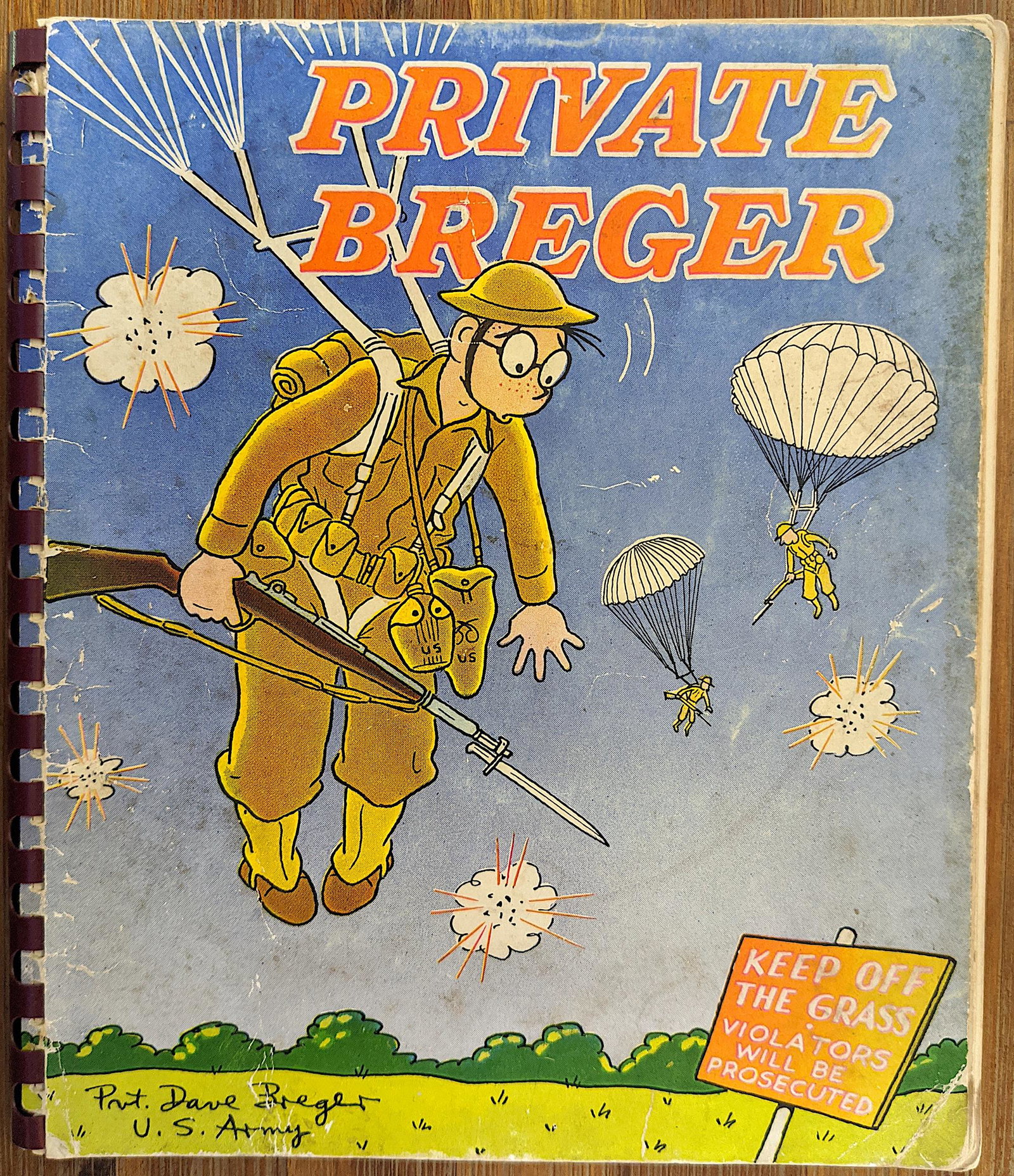 1942 Book of U.S. Army Cartoons: 1942 book of US Army cartoons 2nd. edition. Appears to be signed lower left corner of front cover. Last page is cartoon that includes caricatures of Hitler, Mussolini and others. This lot is located i