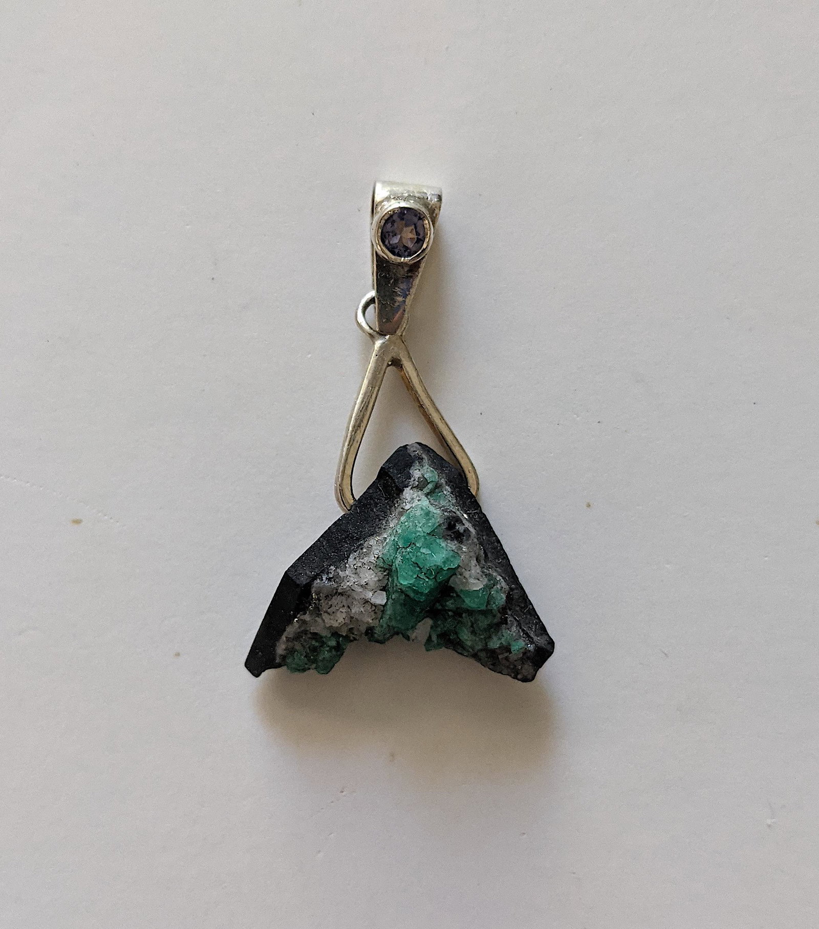 Natural Colombian Emerald Specimen Pendant: This is a highly aesthetic and unique display specimen. Emeralds (chrome-green beryl) of this size and quality are very rarely found in the famous emerald mines of Colombia, and even more rarely do th
