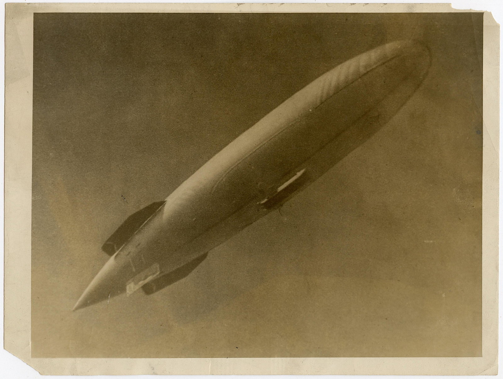 Antique Vintage Real Photo Aviation Zeppelin: Provenance: from a collector in Los Angeles, CA. We have included quality images to show their condition. The dimensions are Approx. 6.25" x 8.5" (small variances can occur). This lot is located in Bo