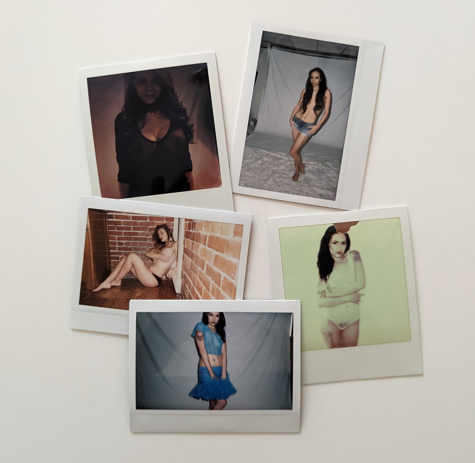 Set 5 Original Polaroid / Intax Photos Pin Up Nudes: Provenance from a Professional American photographer and collector during the last 30 years in LA, CA.. Each Polaroid / Intax film photo measures Aprox. 4.25" x 3.5". This lot is located in Boca Raton