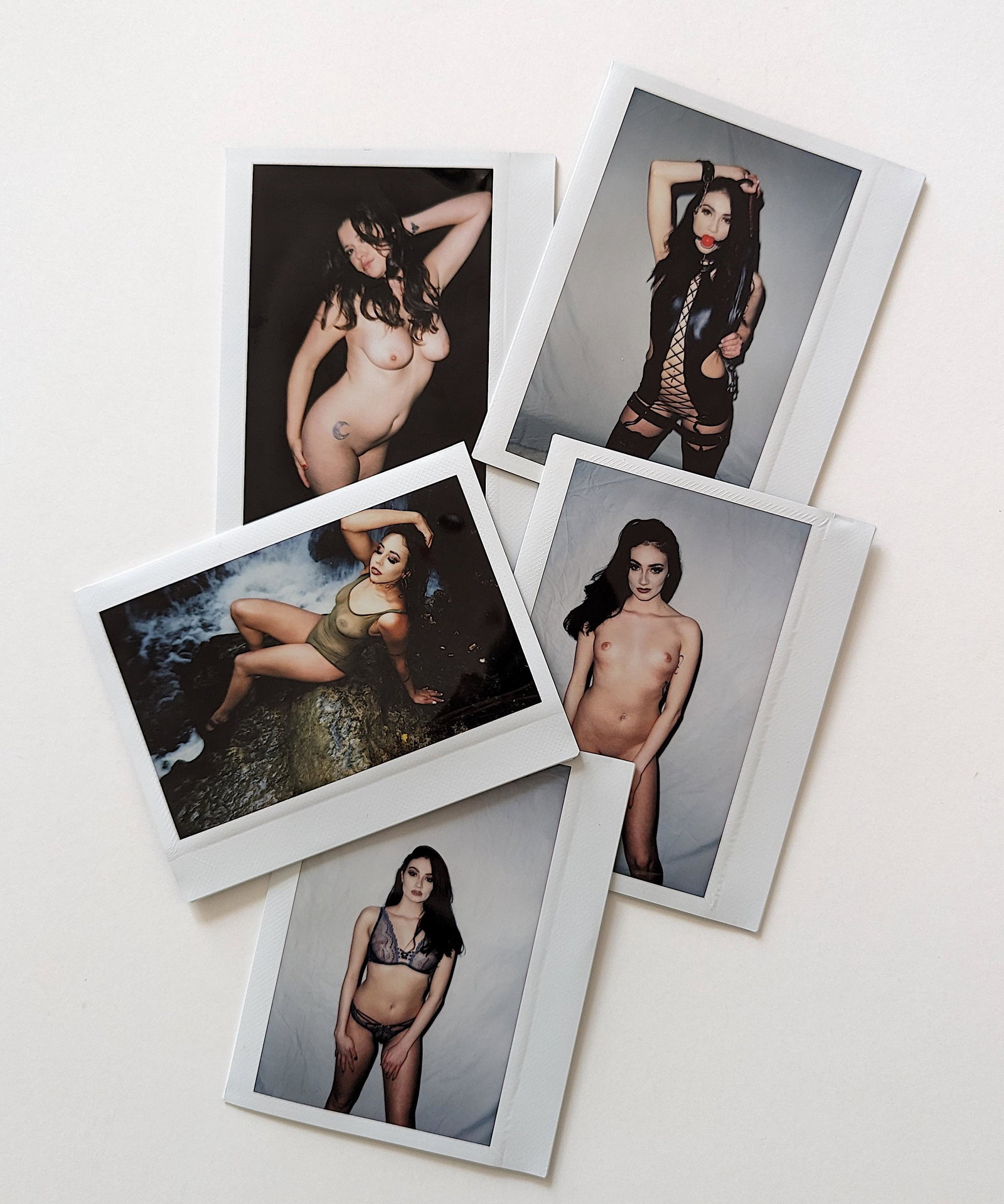 Set 5 Original Polaroid / Intax Photos Pin Up Nudes: Provenance from a Professional American photographer and collector during the last 30 years in LA, CA.. Each Polaroid / Intax film photo measures Aprox. 4.25" x 3.5". This lot is located in Boca Raton