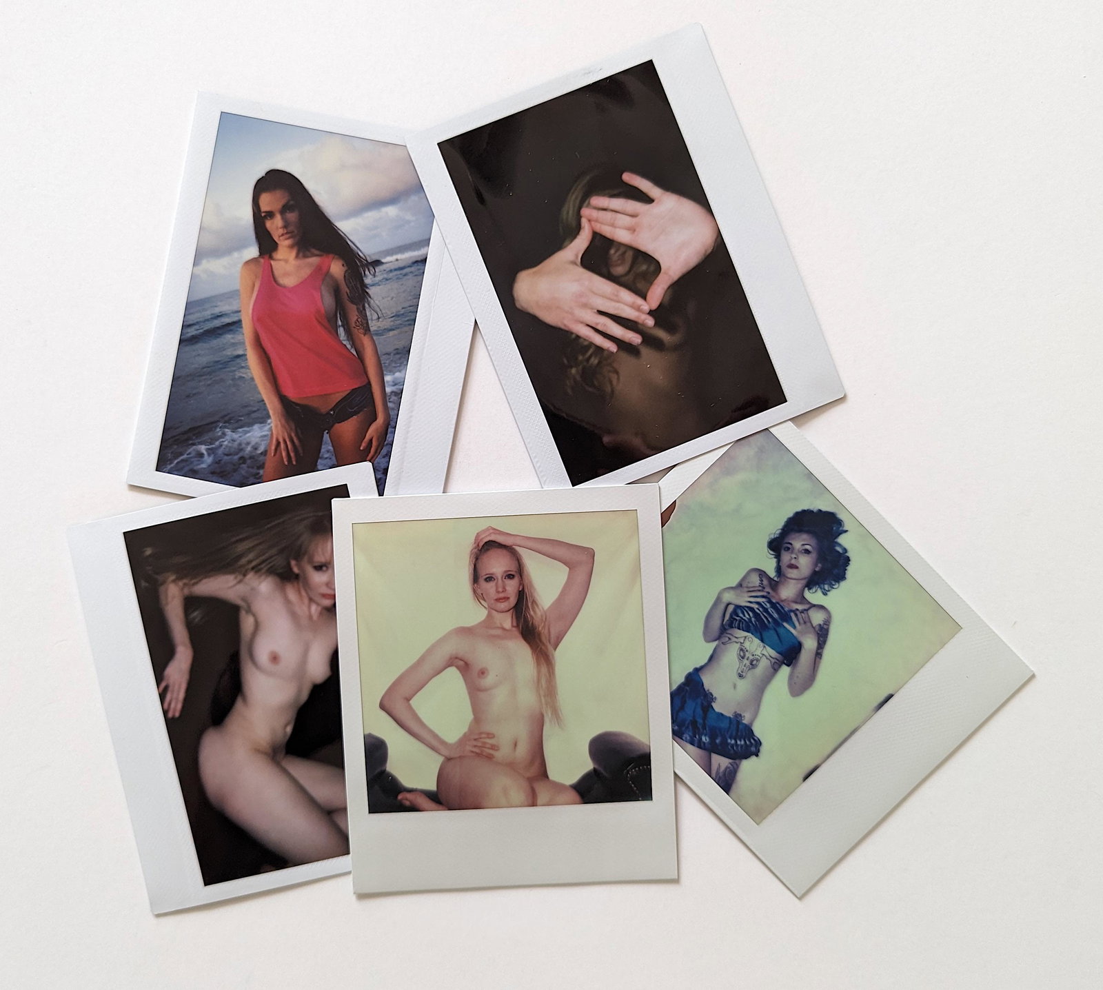 Set 5 Original Polaroid / Intax Photos Pin Up Nudes: Provenance from a Professional American photographer and collector during the last 30 years in LA, CA.. Each Polaroid / Intax film photo measures Aprox. 4.25" x 3.5". This lot is located in Boca Raton