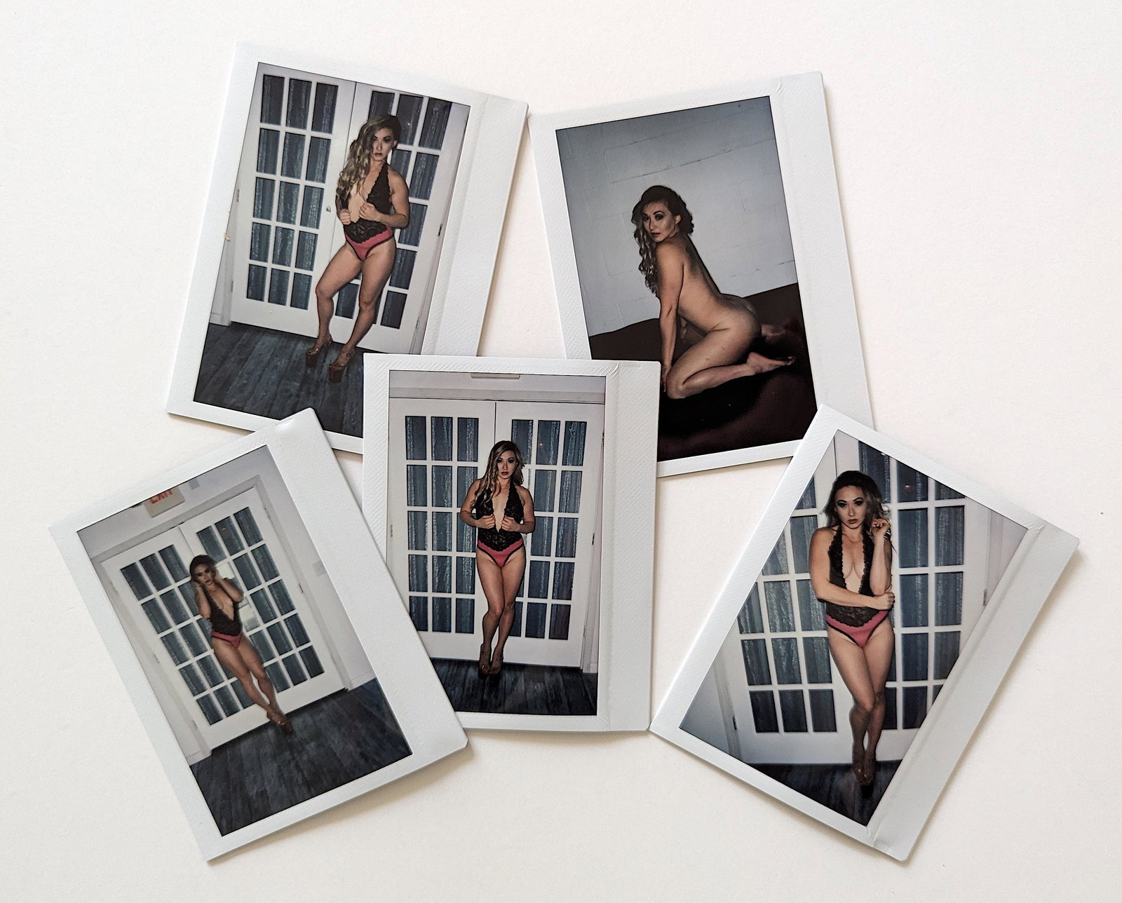 Set 5 Original Polaroid / Intax Photos Pin Up Nudes: Provenance from a Professional American photographer and collector during the last 30 years in LA, CA.. Each Polaroid / Intax film photo measures Aprox. 4.25" x 3.5". This lot is located in Boca Raton