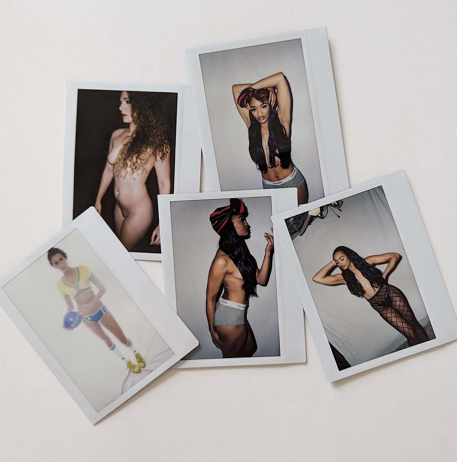 Set 5 Original Polaroid / Intax Photos Pin Up Nudes: Provenance from a Professional American photographer and collector during the last 30 years in LA, CA.. Each Polaroid / Intax film photo measures Aprox. 4.25" x 3.5". This lot is located in Boca Raton