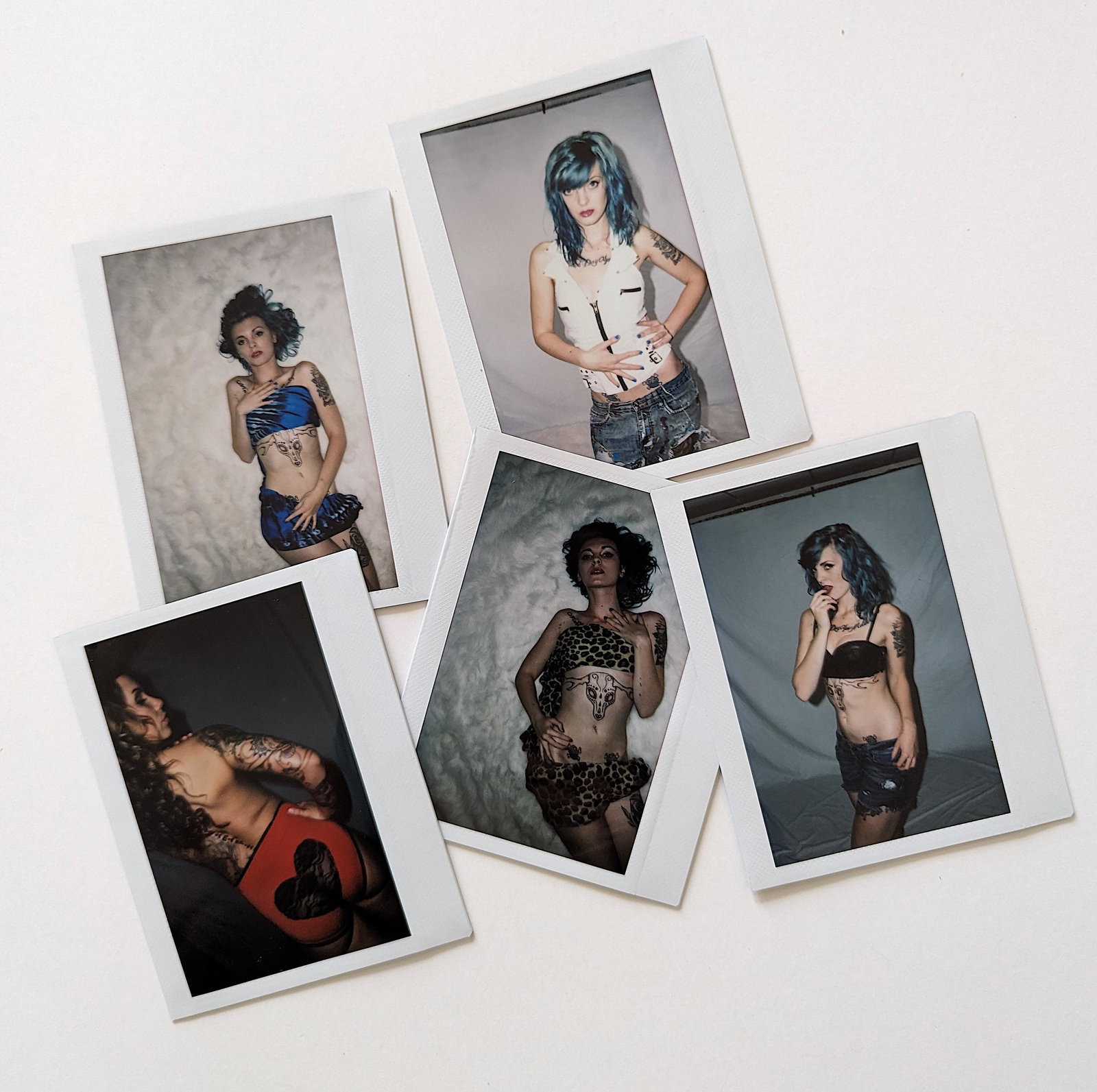 Set 5 Original Polaroid / Intax Photos Pin Up Nudes: Provenance from a Professional American photographer and collector during the last 30 years in LA, CA.. Each Polaroid / Intax film photo measures Aprox. 4.25" x 3.5". This lot is located in Boca Raton
