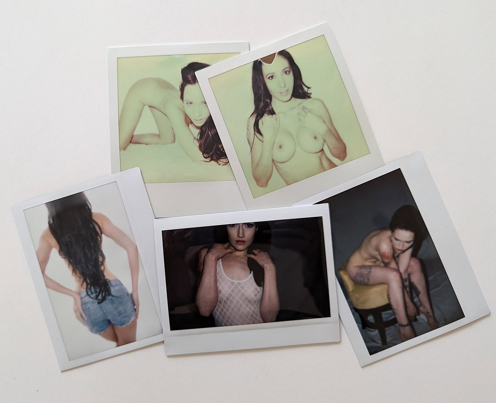 Set 5 Original Polaroid / Intax Photos Pin Up Nudes: Provenance from a Professional American photographer and collector during the last 30 years in LA, CA.. Each Polaroid / Intax film photo measures Aprox. 4.25" x 3.5". This lot is located in Boca Raton