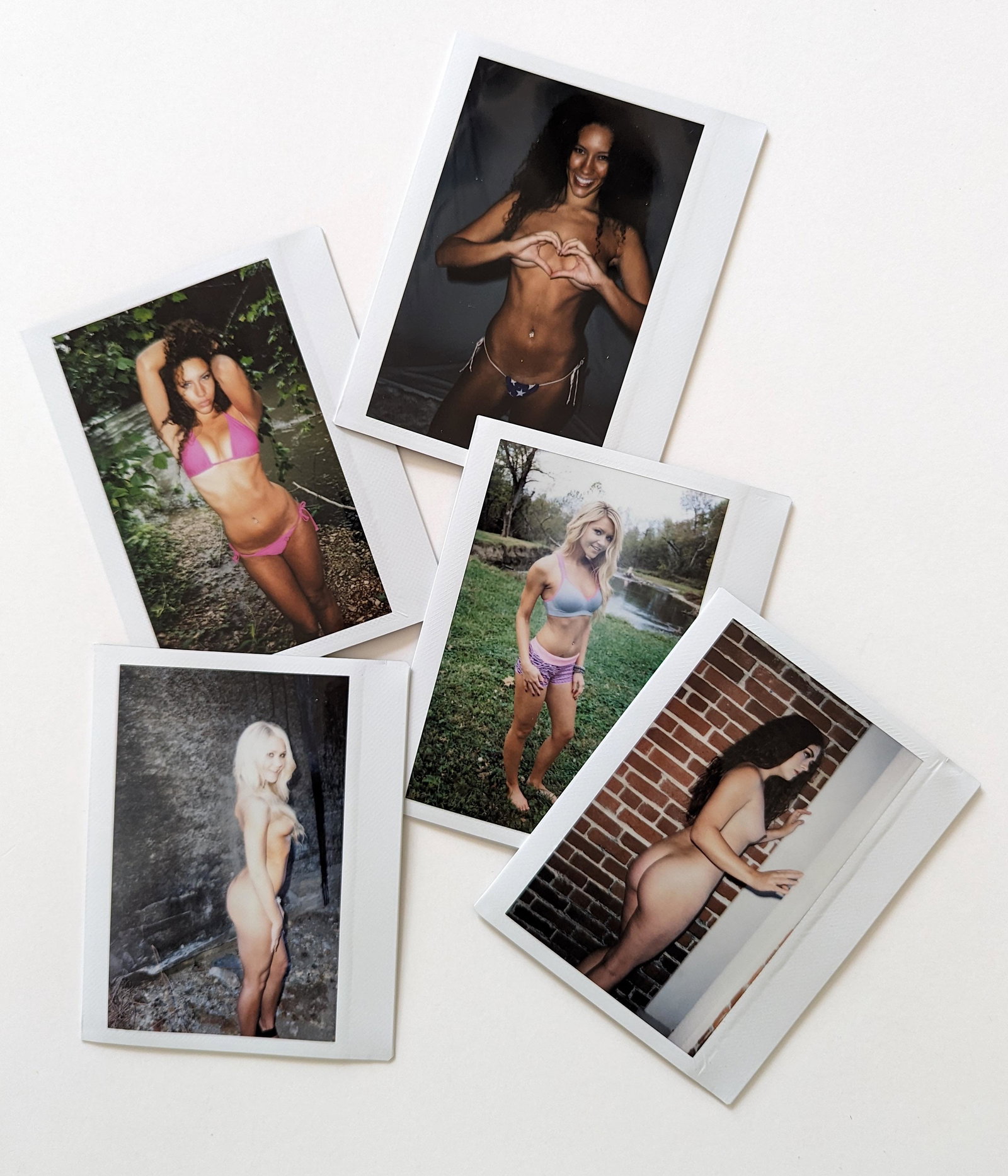 Set 5 Original Polaroid / Intax Photos Pin Up Nudes: Provenance from a Professional American photographer and collector during the last 30 years in LA, CA.. Each Polaroid / Intax film photo measures Aprox. 4.25" x 3.5". This lot is located in Boca Raton