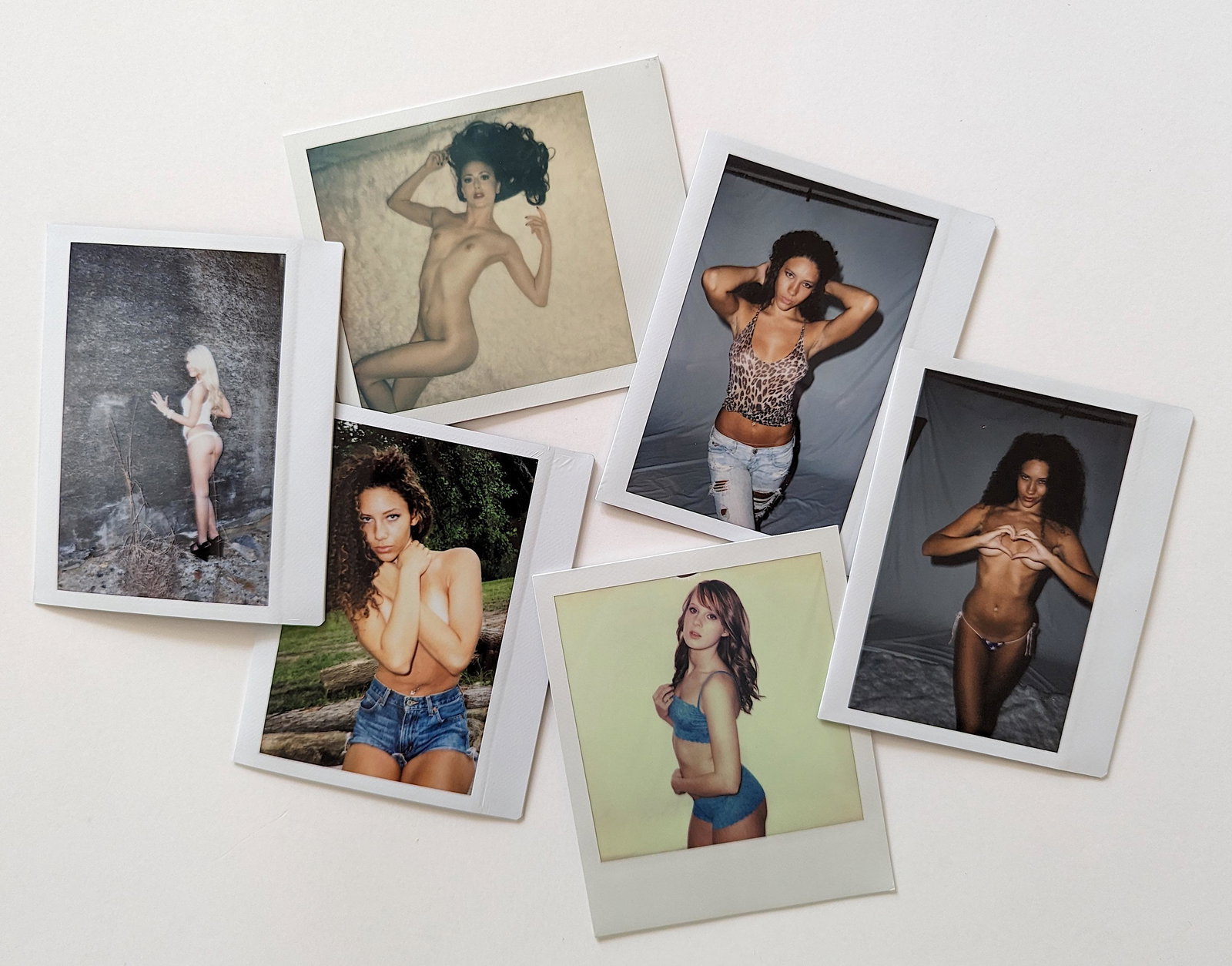 Set 5 Original Polaroid / Intax Photos Pin Up Nudes: Provenance from a Professional American photographer and collector during the last 30 years in LA, CA.. Each Polaroid / Intax film photo measures Aprox. 4.25" x 3.5". This lot is located in Boca Raton