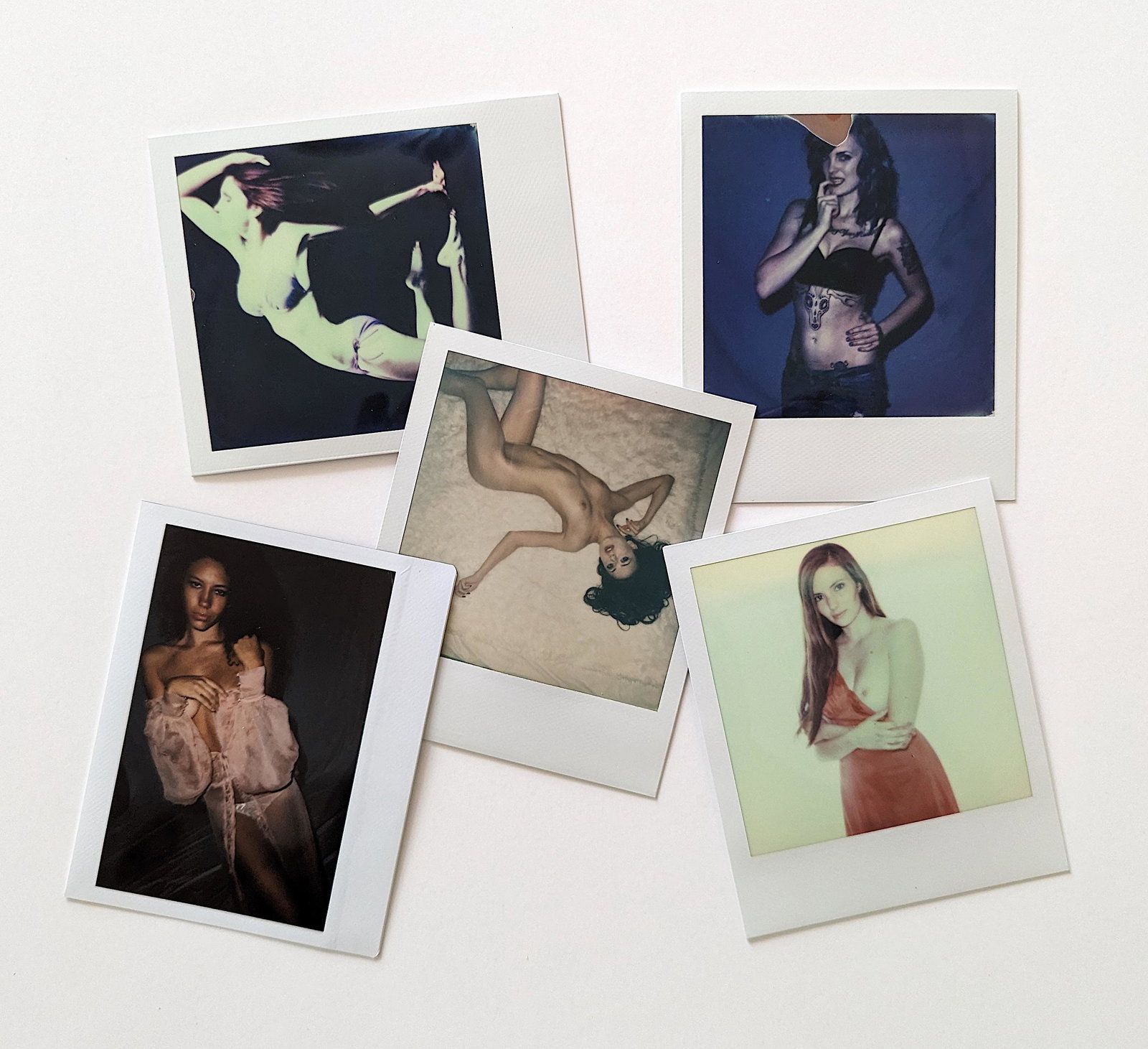 Set 5 Original Polaroid / Intax Photos Pin Up Nudes: Provenance from a Professional American photographer and collector during the last 30 years in LA, CA.. Each Polaroid / Intax film photo measures Aprox. 4.25" x 3.5". This lot is located in Boca Raton