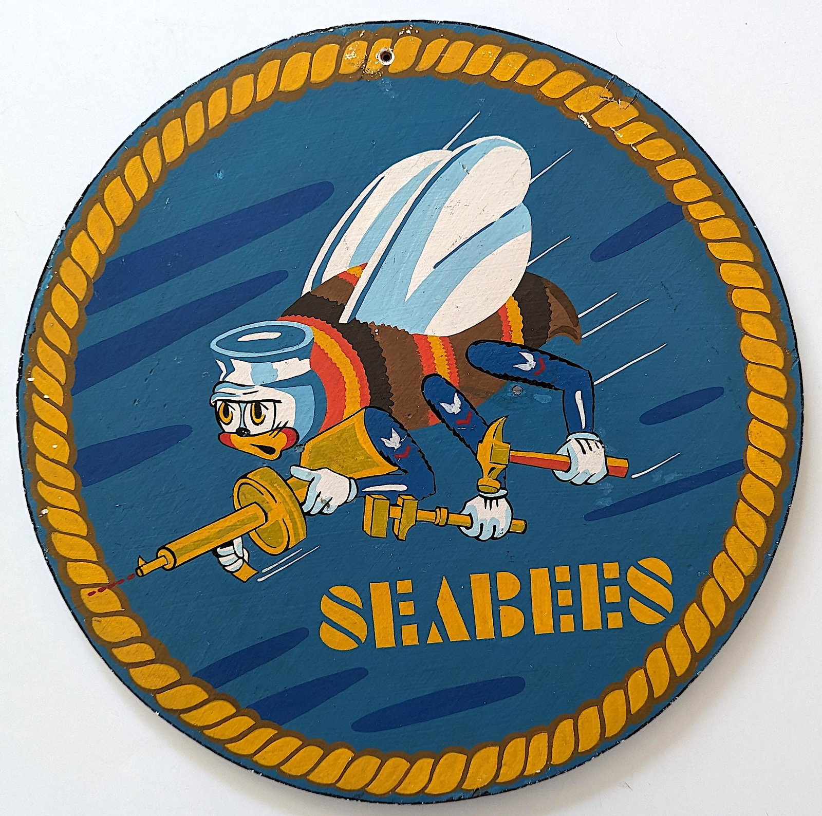 Vintage Original Wood Sign U.S. Navy SEABEES: Provenance from the estate of a deceased american military collector. The dimensions are Approx. 18" Diameter. We have included images to show it's actual condition.