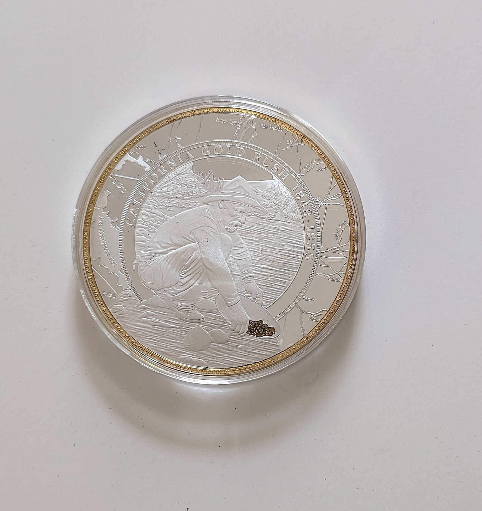 American Gold Rush California Jumbo 4" Comm. Coin: A 4" silver-plated coin accented in 24k gold. This lot is coming from the estate of a deceased collector in South Florida. We have attached quality images to show its actual condition. This lot is loc