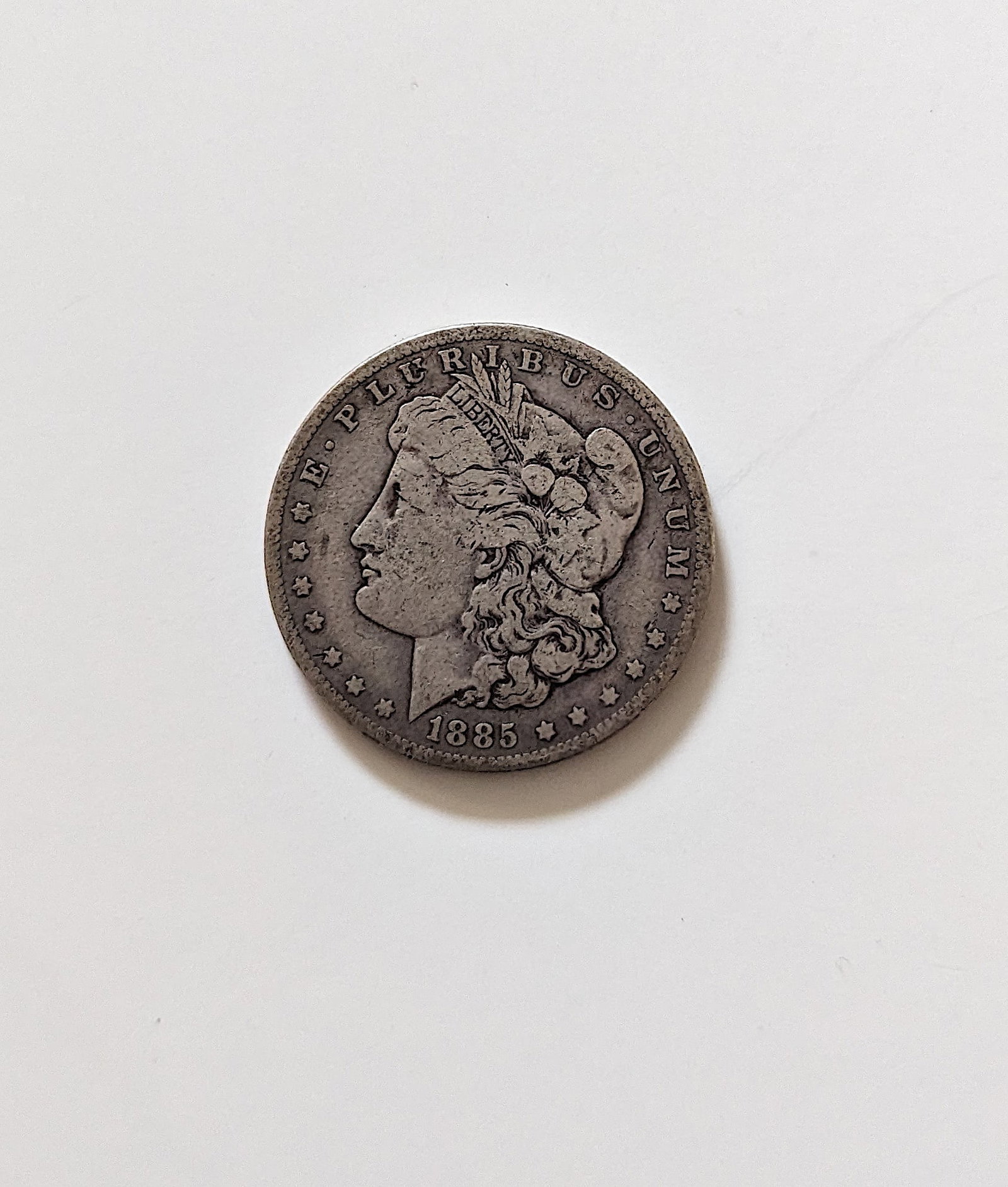 Coin Collector 1885 Morgan Silver Dollar: This lot is coming from the estate of a deceased collector in South Florida. We have attached quality images to show its actual condition. This lot is located in Boca Raton, Fl and its shipment will b