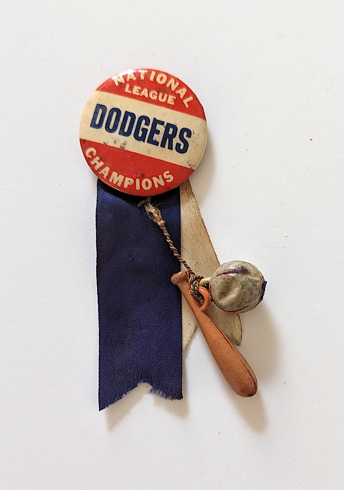 1950's Baseball Dodgers Pinback Pin with Charms & Ribbons: The dimensions are Approx. 9.5" x 8" (Small variances can occur)".We have attached quality images to show its actual condition. This lot is located in Boca Raton, Fl and its shipment will be made dire