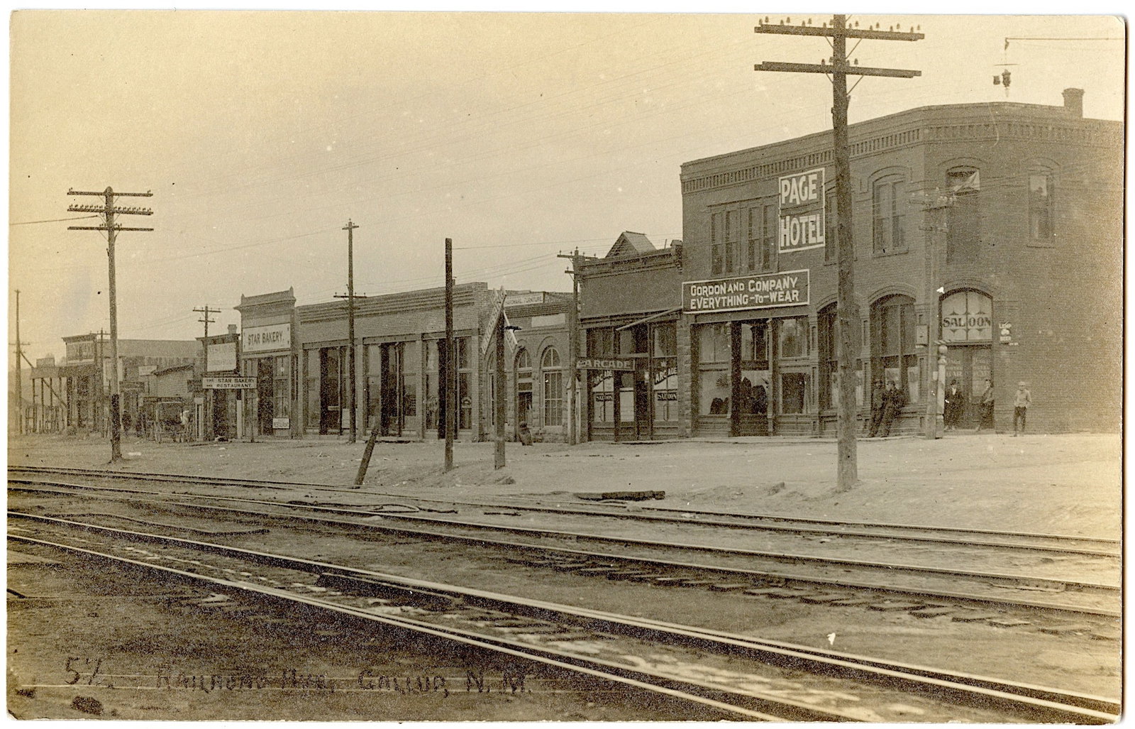 Real Photo PC of CAFE HOTEL New Mexico 1910's Unused: Real photo PC of "Page Hotel" with "arcade Saloon" on left and "Saloon" on right. Gallup, New Mexico, Ca. 1910s, unused. The provenance of this lot is from a quality collector in Longview, Texas. We h