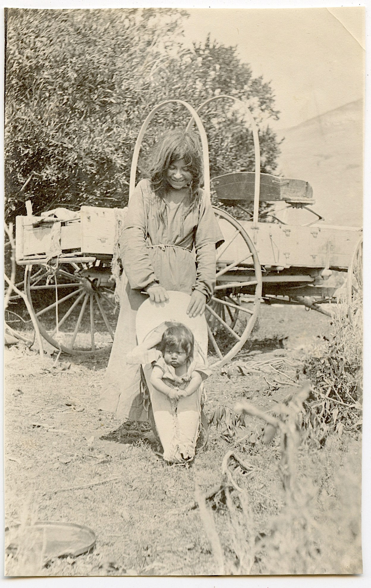 Photo (No PC) of Squaw and Pappoos, Idaho, 1900: Photo (Not a Post Card) of Squaw and Pappoos, Ca. 1900, stamped Twin Falls, Idaho on Back. Dimensions 3" x 4.75". The provenance of this lot is from a quality collector in Longview, Texas. We have inc