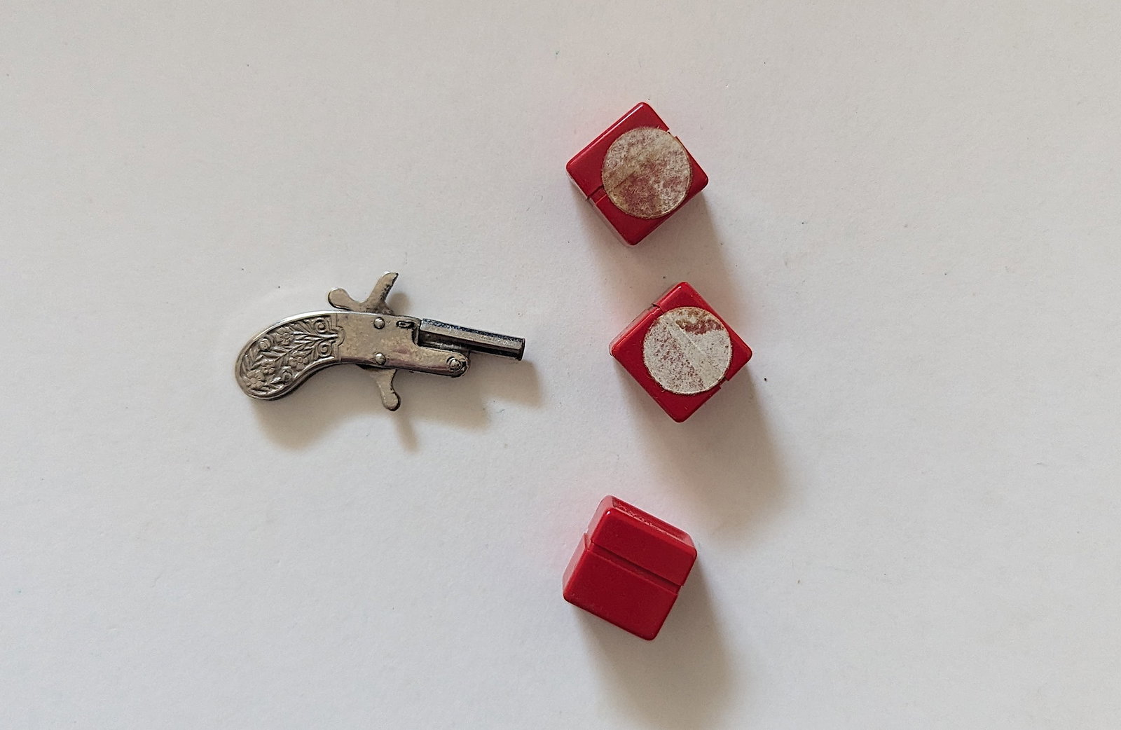 Miniature Xythos Pinfire Gun Pistol & 3 Cartridges Cases: Provenance from a deceased collector in South Florida. We have included quality images to show it's actual condition. This lot is located in Boca Raton, Fl and its shipment will be made directly by Ar