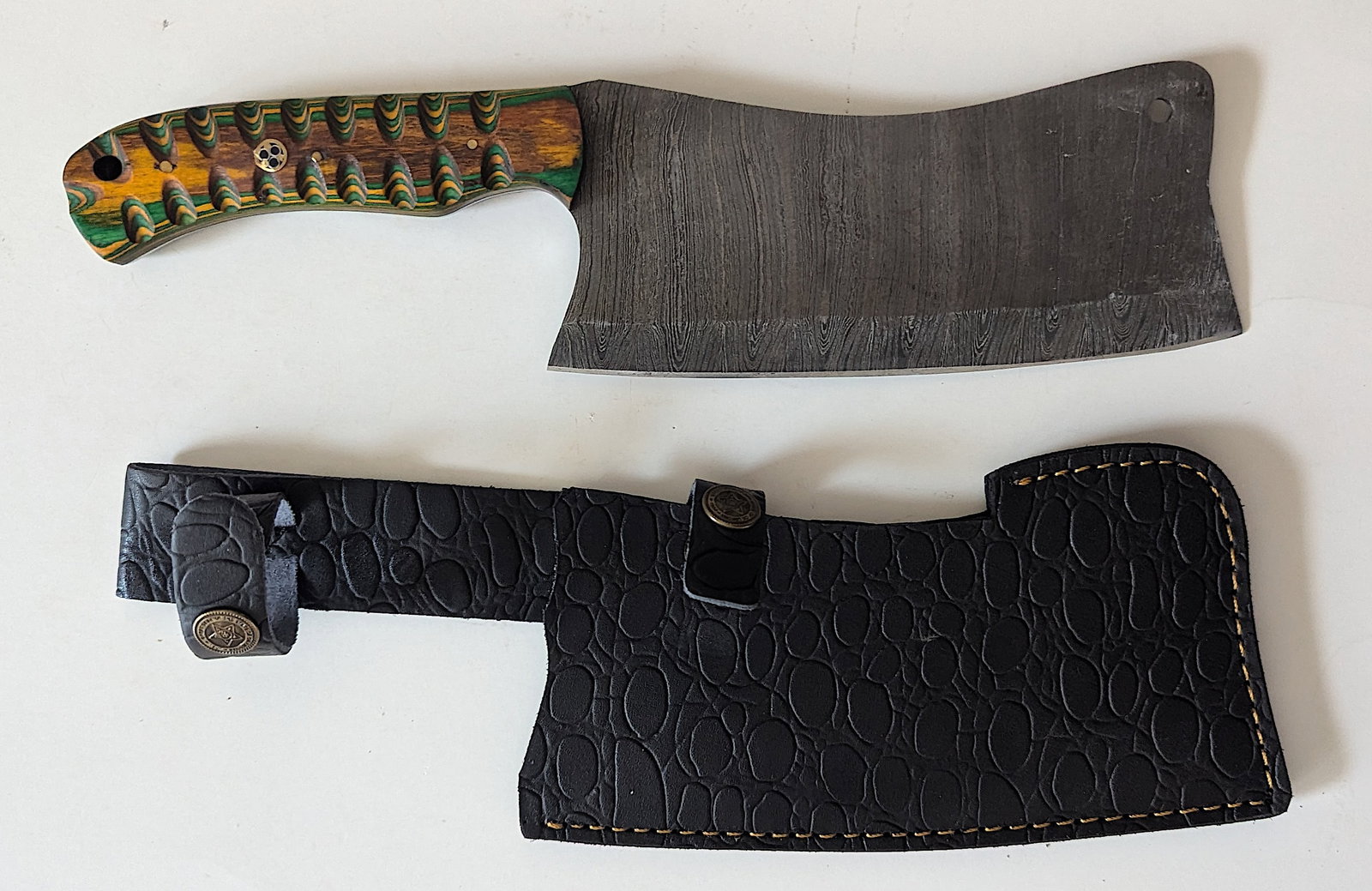 Handcrafted Heirloom Damaskus Steel Knife 12" Long x 3": These aren't your average factory-made knives. Each handmade damascus knife is a unique work of art, forged with time-honored techniques and the skill of a dedicated craftsperson. The distinctive laye