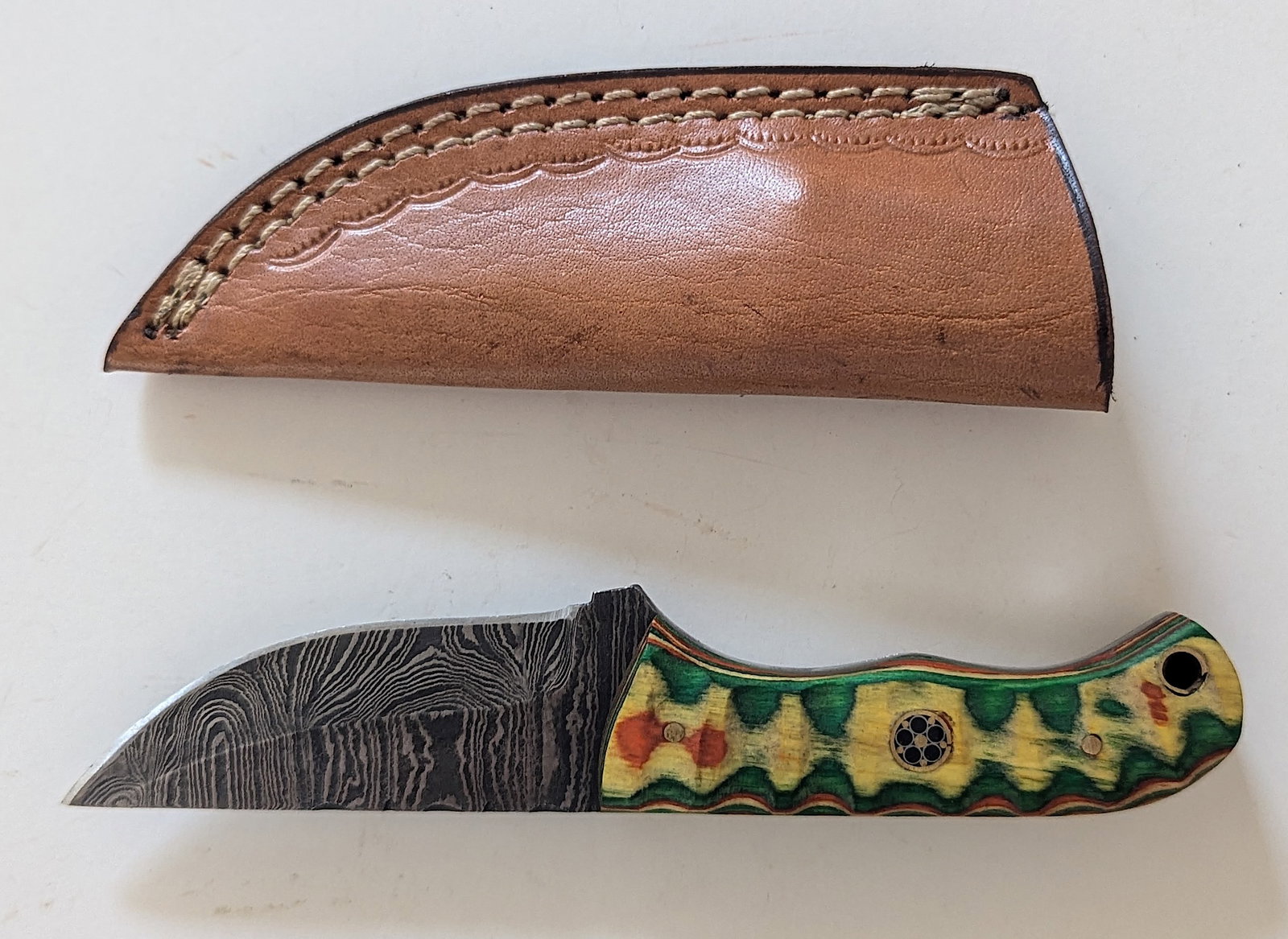 Handcrafted Heirloom Damaskus Steel Knife 6.5" Long: These aren't your average factory-made knives. Each handmade damascus knife is a unique work of art, forged with time-honored techniques and the skill of a dedicated craftsperson. The distinctive laye