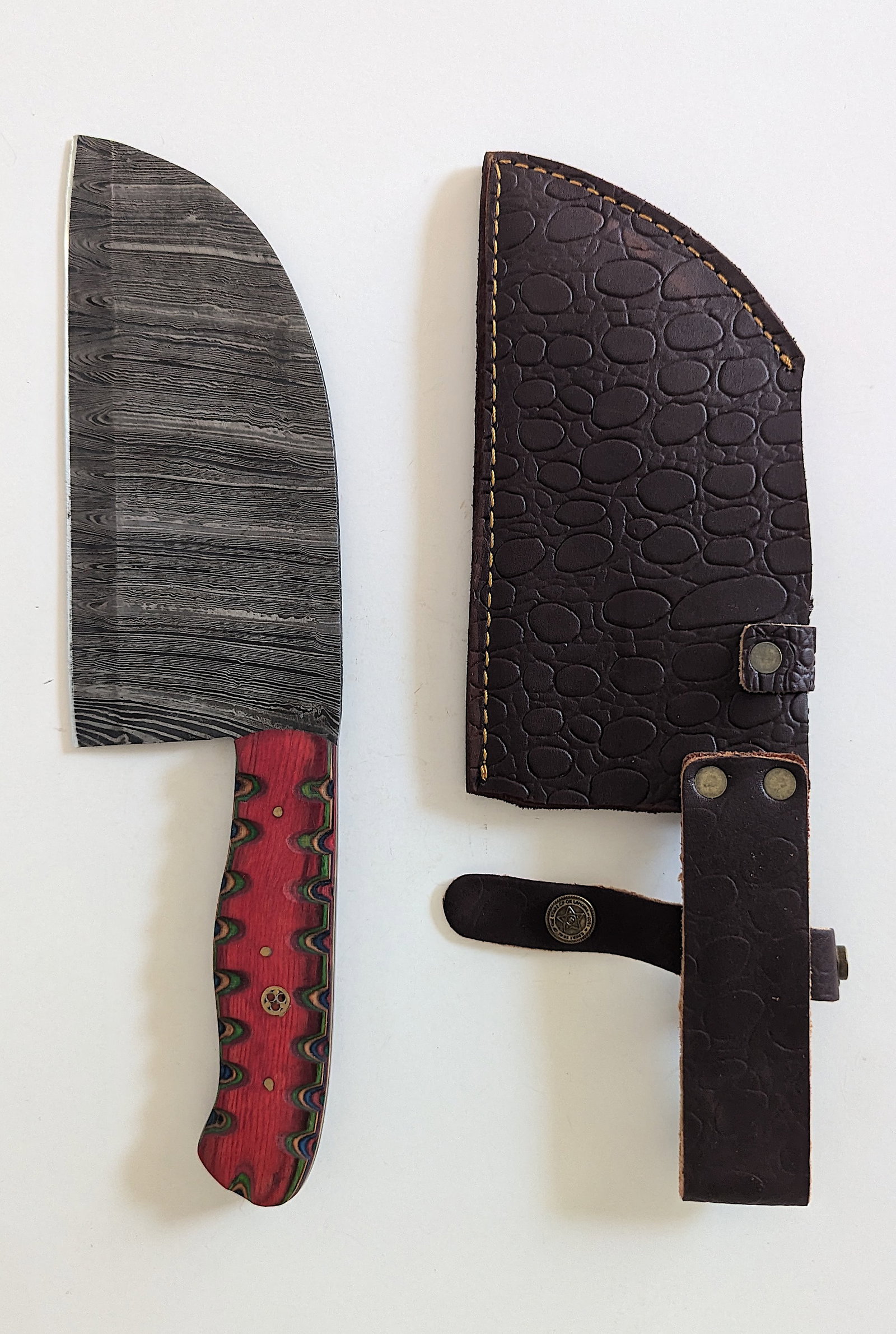 Handcrafted Heirloom Damaskus Steel Knife 12" Long: These aren't your average factory-made knives. Each handmade damascus knife is a unique work of art, forged with time-honored techniques and the skill of a dedicated craftsperson. The distinctive laye