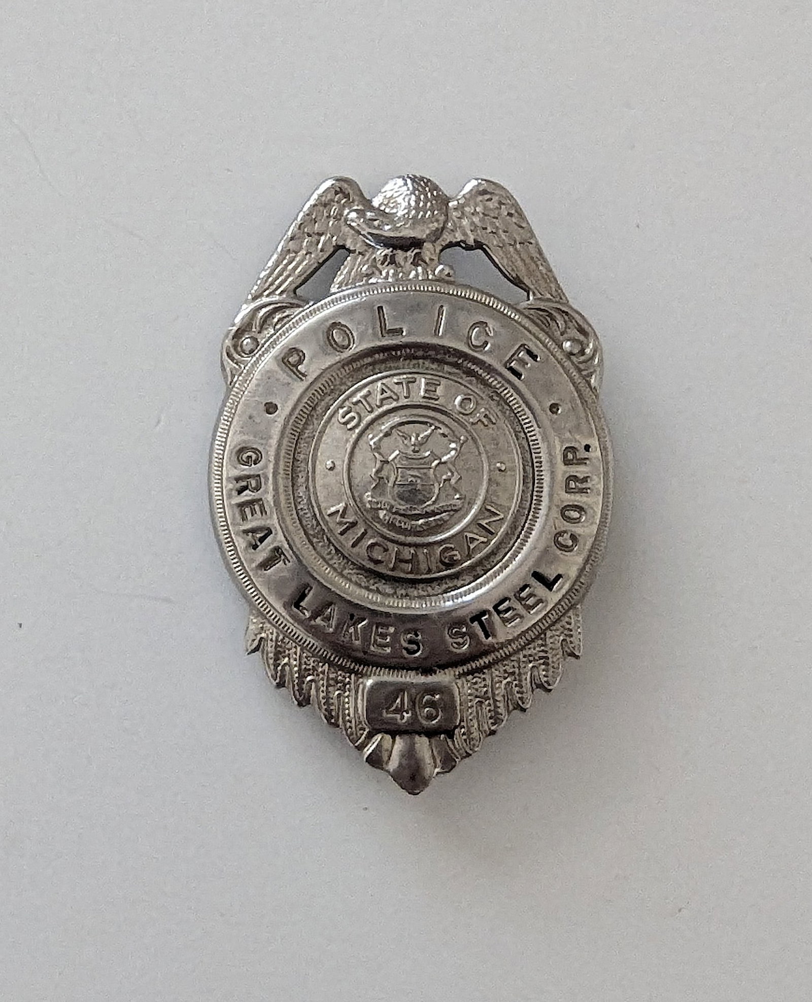 Vintage Great Lakes Steel Police Badge - State of Michigan: The provenance of this lot is from a quality collector PBC. Please see all the included images to read all related information. We have included quality scans to show it's actual condition. This lot i