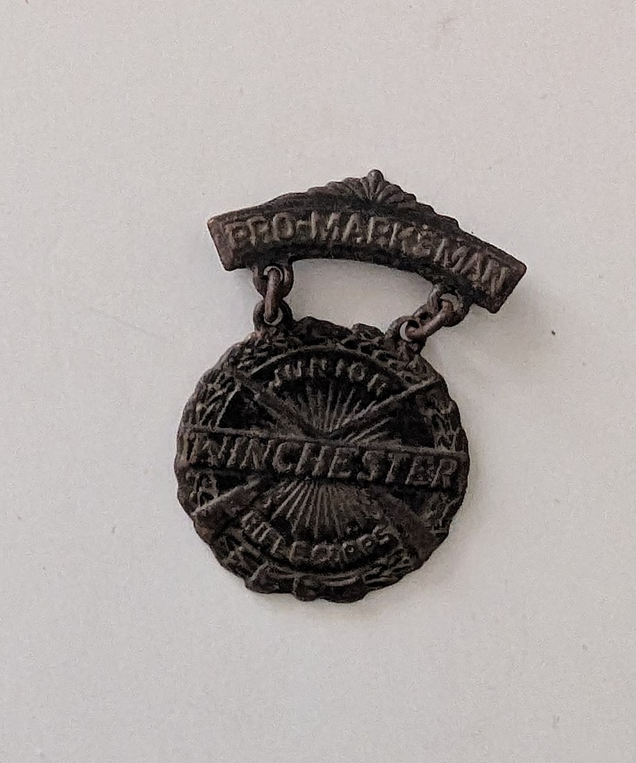 Winchester Pro-Marksman Vintage Medal Pin Award Crossed Rifle Gun Badge: This lot is coming from the estate of a photographer in LA. We have included a quality scan to show it's actual condition. This lot is located in Boca Raton, Fl and its shipment will be made directly 