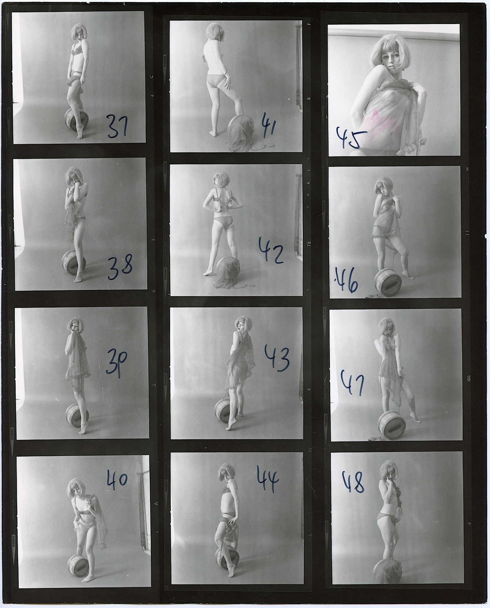 BRUCE WARLAND Hippie Era Contact Sheet Photo Pin Up Stamped: This original contact sheet by British Photographer Bruce Warland is from the Hippie Era 1960s - 1970s. The name of the Pin Up model was hand written on the back. This lot is coming from the estate of