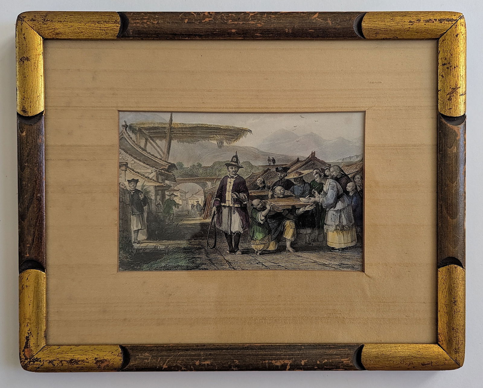 Punishment of the tcha or cangue in Ting-hai, China, 1858: This antique hand-colored engraving captures a historical scene titled "Punishment of the Tcha or Cangue in Ting-hai, China." Published in 1858 by Thomas Allom in "The Chinese Empire Illustrated," thi