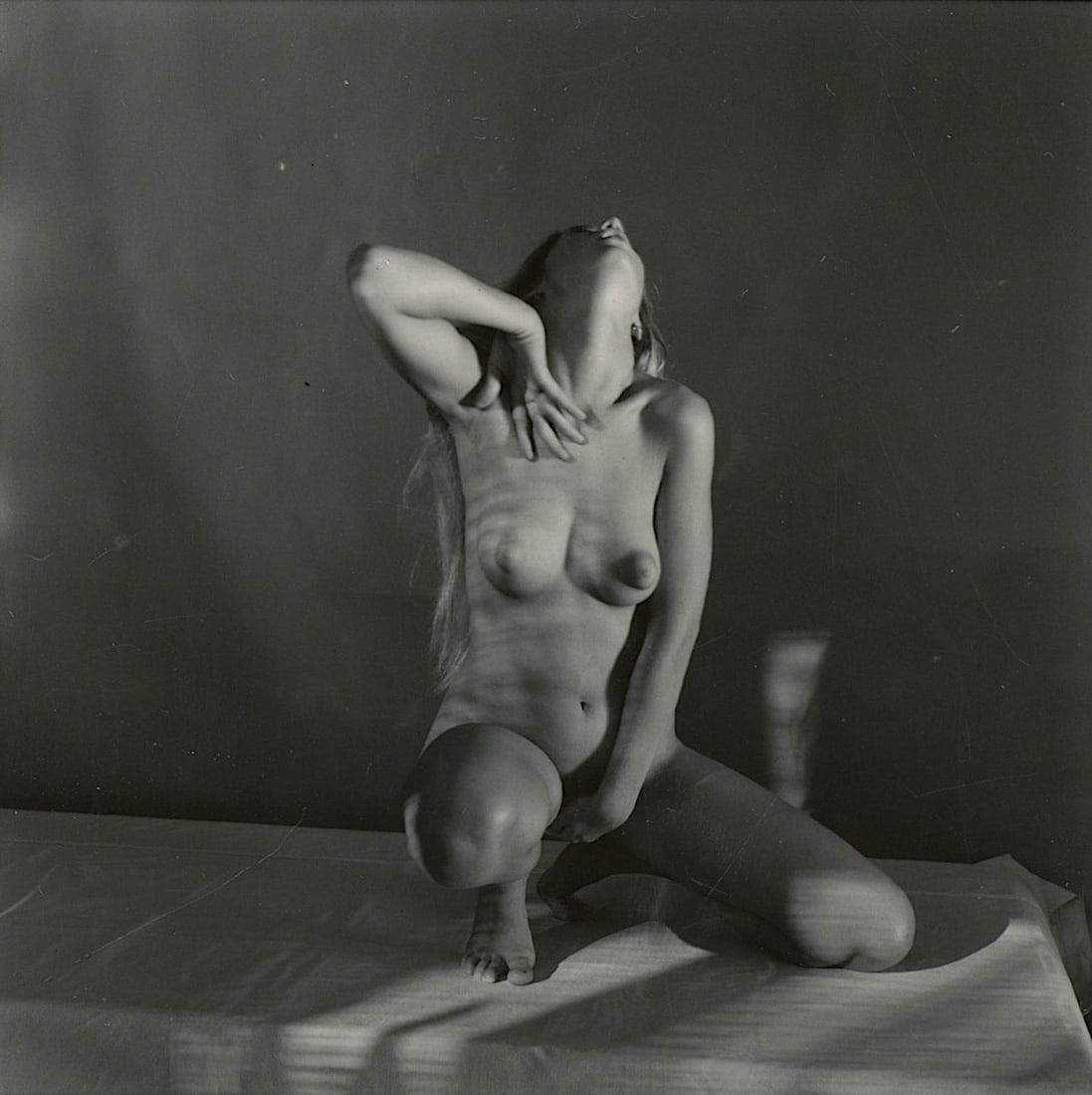 ANDRÉ DE DIENES Vintage Photo 1950s-1960s Nude Study: The provenance of this photo is from the archives of notable photographer André de Dienes.The dimensions are Approx. 2.75" x 2.75" (small variances can occur). This black and white gelatin photo was 