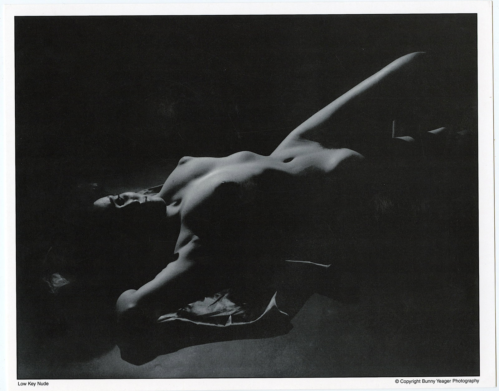 BUNNY YEAGER Vintage Pin Up Litho LOW KEY NUDE: This lot is coming from Bunny Yeager's estate/archives. Linnea Eleanor "Bunny" Yeager (March 13, 1929 - May 24, 2014) was an American photographer and pin-up model. She met Bettie Page in 1954, and to