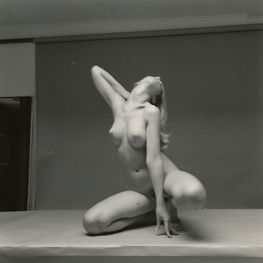 ANDRÉ DE DIENES Vintage Photo 1950s-1960s Nude Study: The provenance of this photo is from the archives of notable photographer André de Dienes.The dimensions are Approx. 2.75" x 2.75" (small variances can occur). This black and white gelatin photo was 